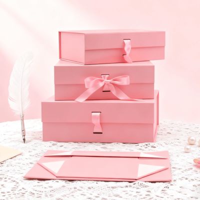 कस्टम लोगो गुणवत्ता रिबन फोल्डिंग बॉक्स गुलाबी काला आयत आकार चुंबकीय कला कागज मैट फाड़ना एम्बॉसिंग के लिए पैकेजिंग